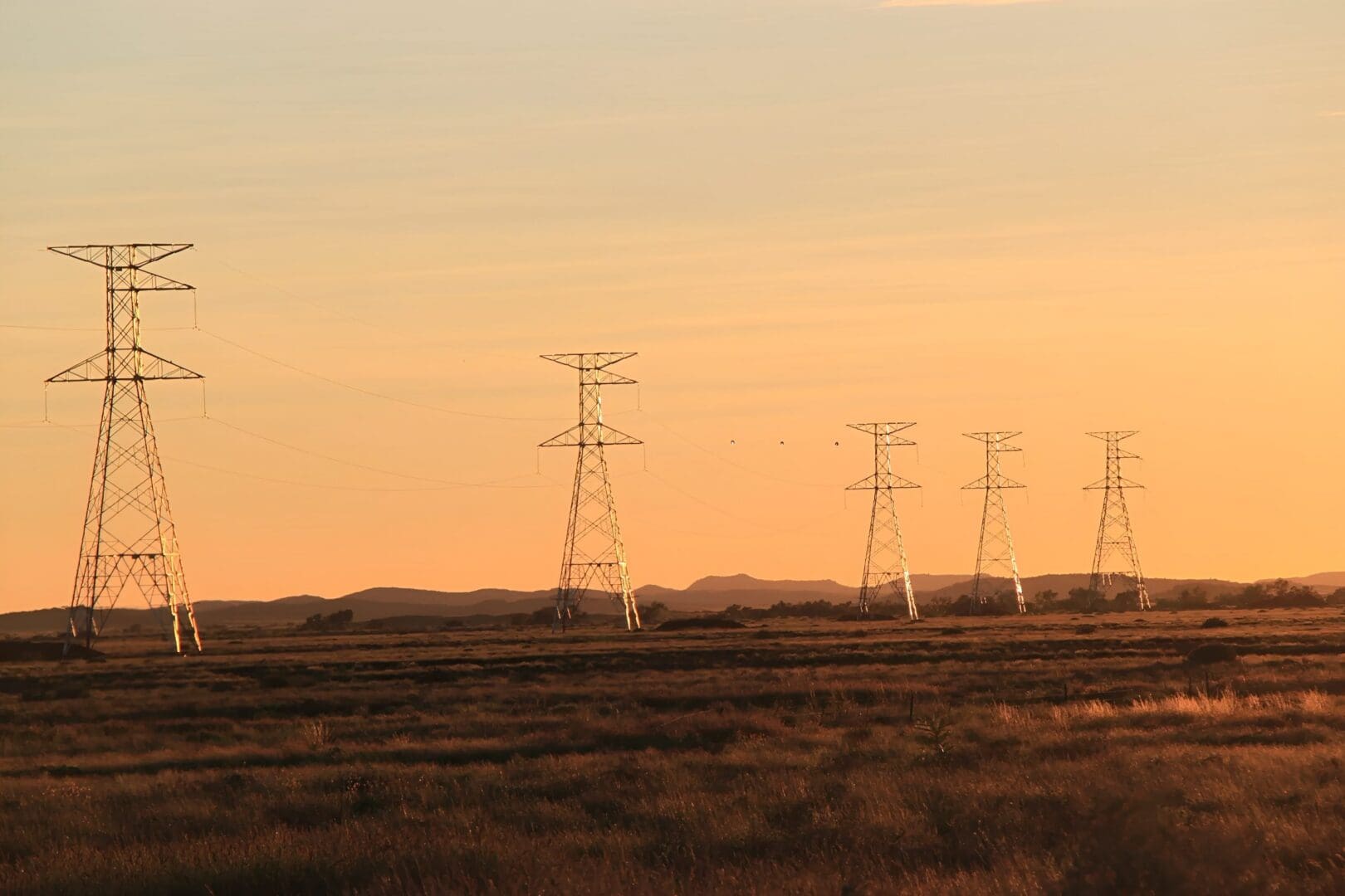 Transmission towers across landscape