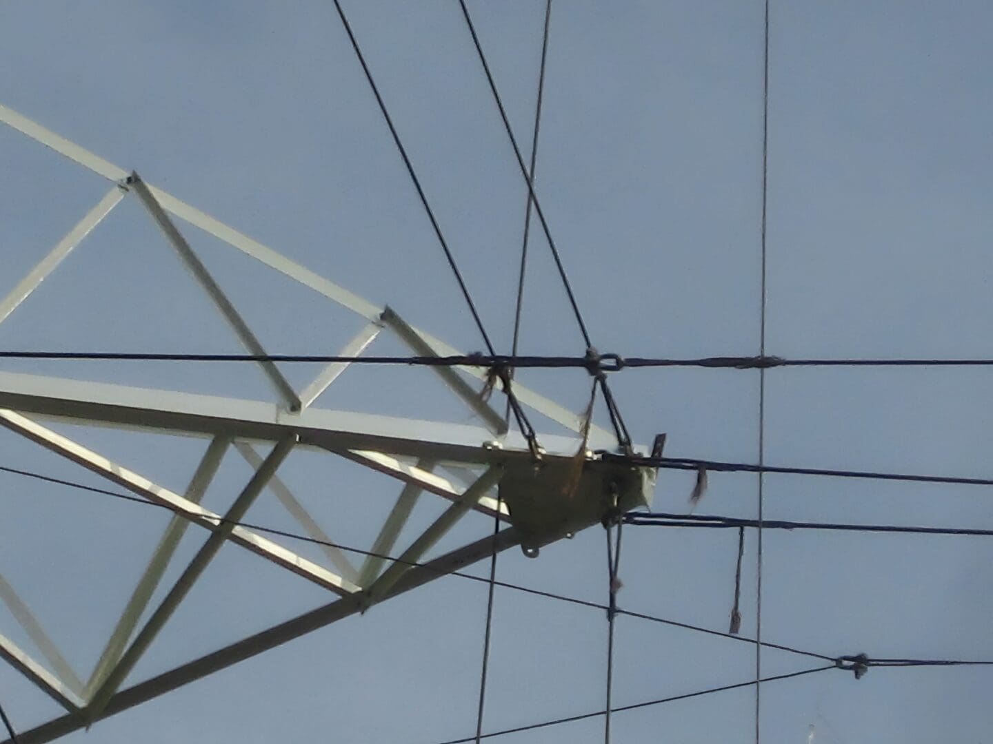 Close-up of steel lattice and wires