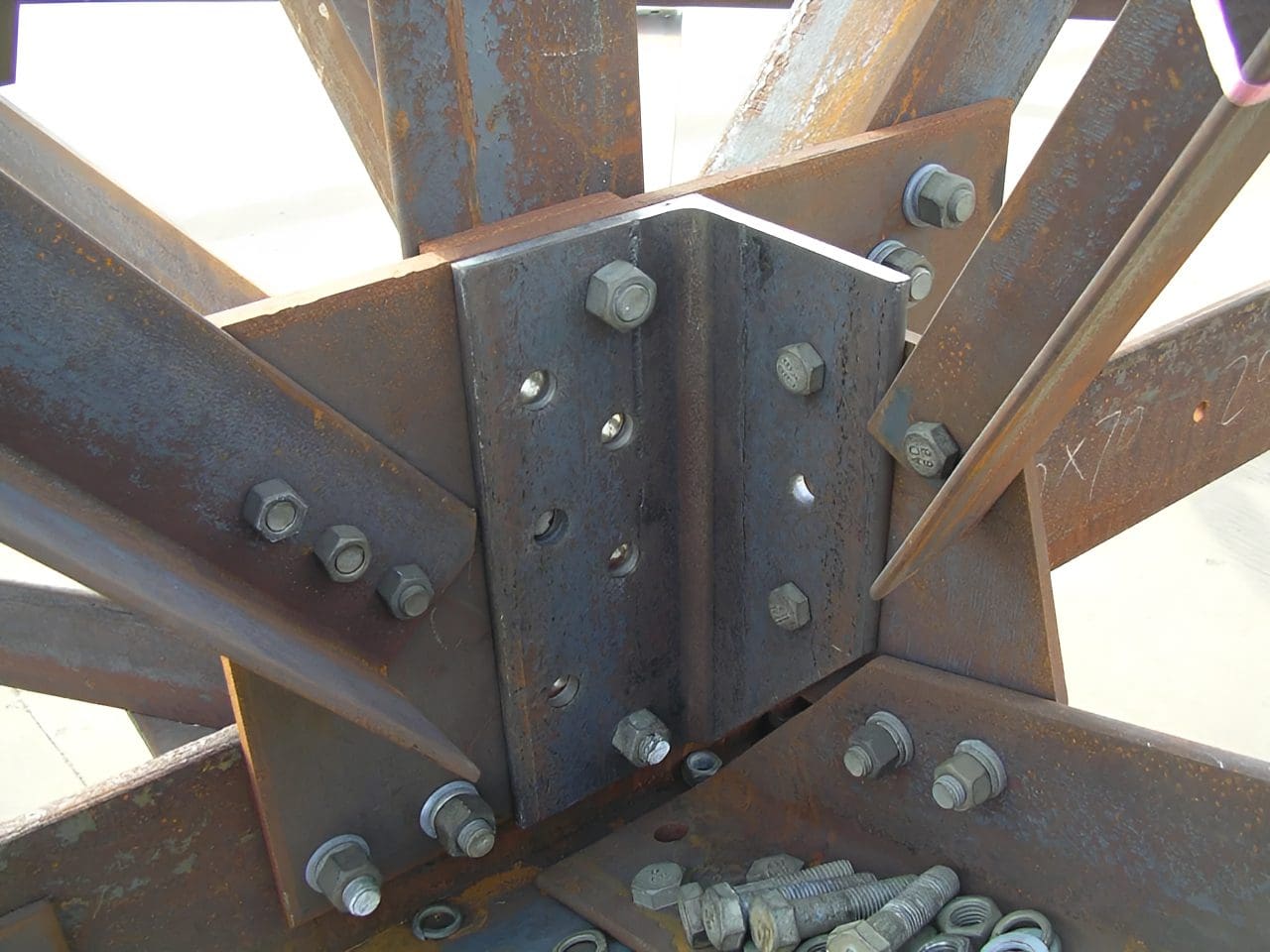 Close-up of metal beams with bolts.