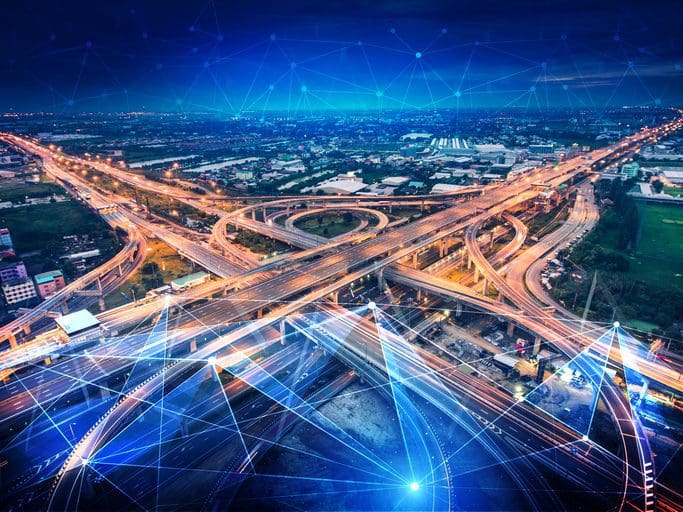 Aerial highway interchange with digital network overlay