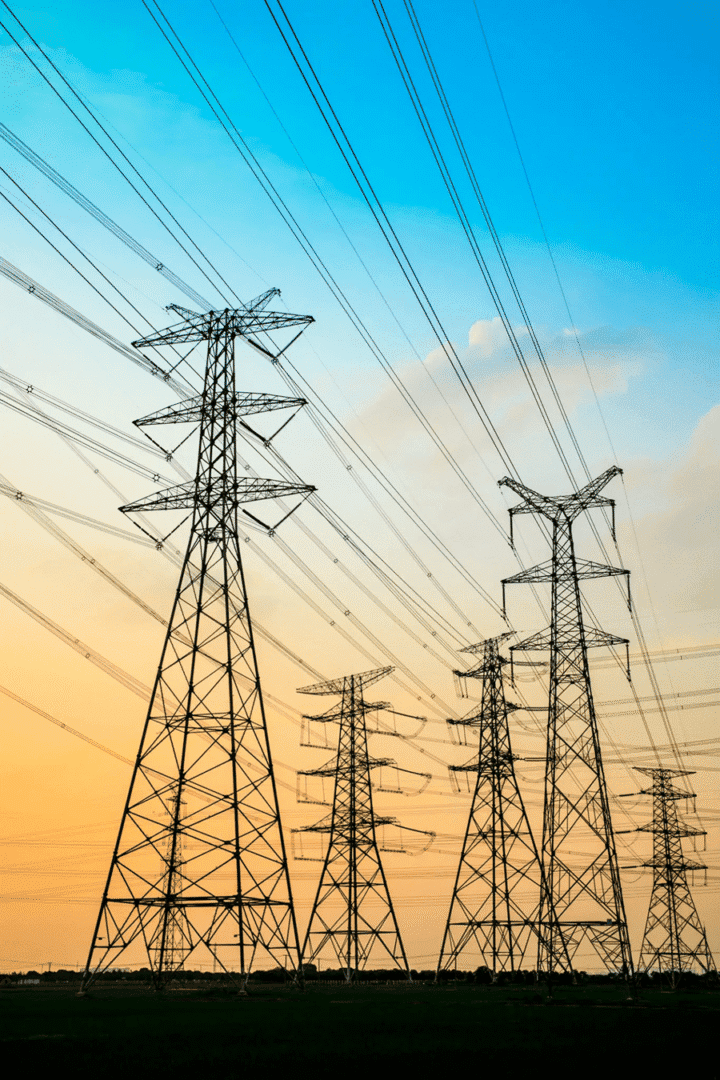 Rows of high-voltage pylons and power lines